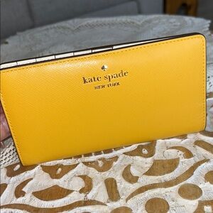 Kate Spade NWT “ daffodil “ saffiano leather wallet beautiful sunflower color